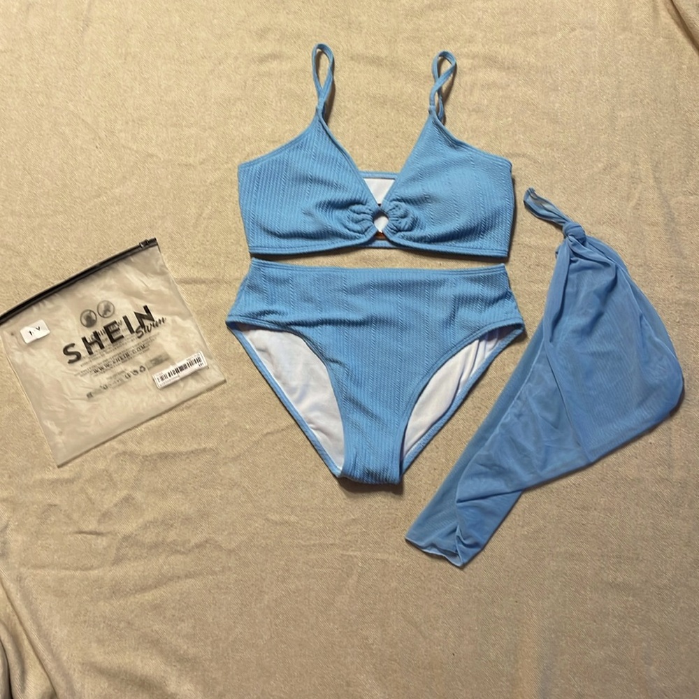 Teen baby blue bikini. Includes mesh bottom cover up. Textured bikini.